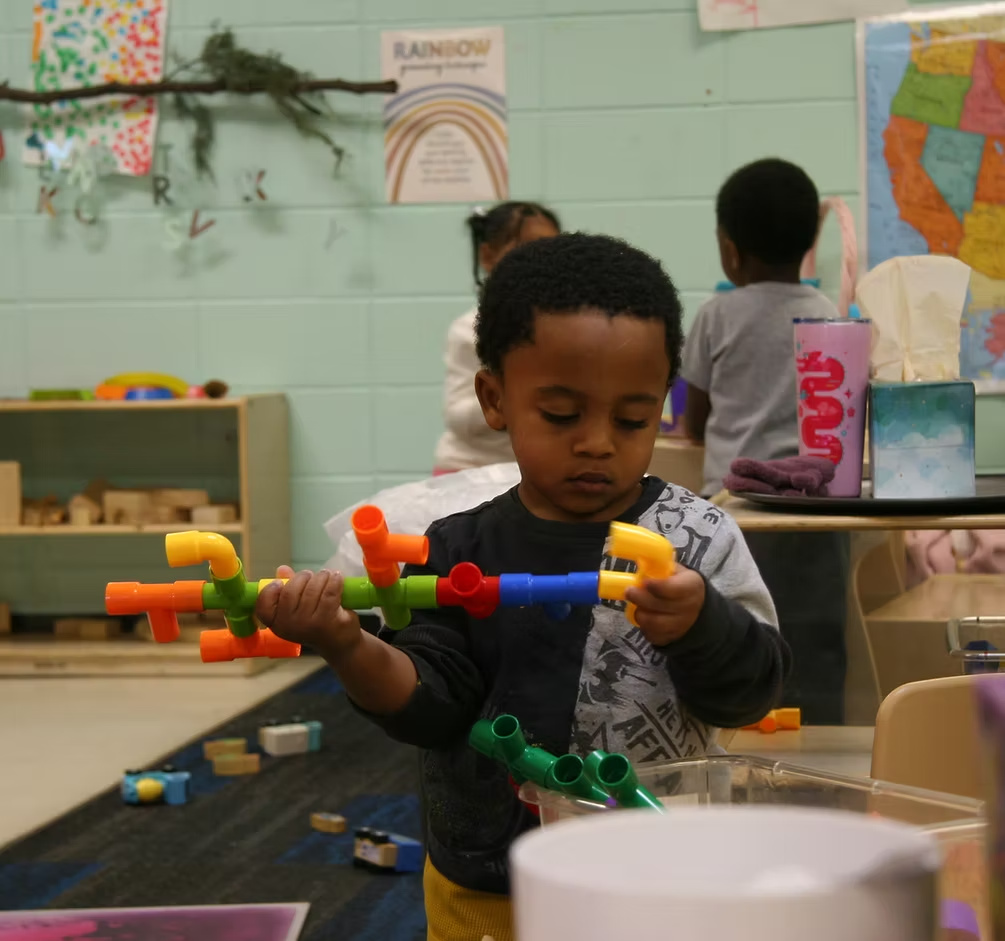 A S.L.A.M. scholar engaged in learning