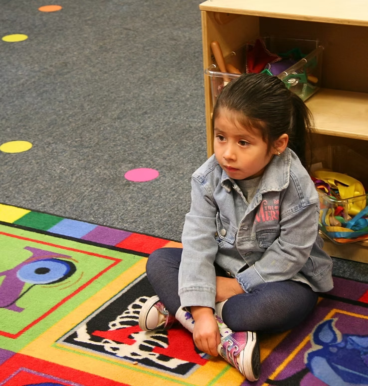 A child learning at Village of Promise